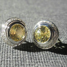 Yellow sapphires and diamonds earrings.