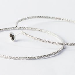 White gold and diamonds hoops.