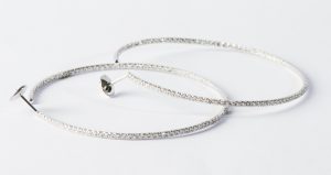 White gold and diamonds hoops.