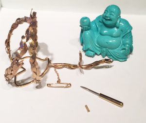 Turquoise and gold Buddha.
