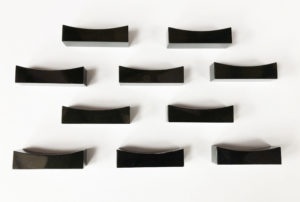 Black jadeite chopsticks rest.