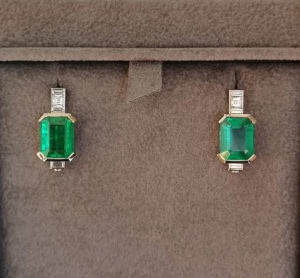 Emerald and diamond earrings.
