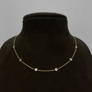 Collier or jaune ethique et diamant.